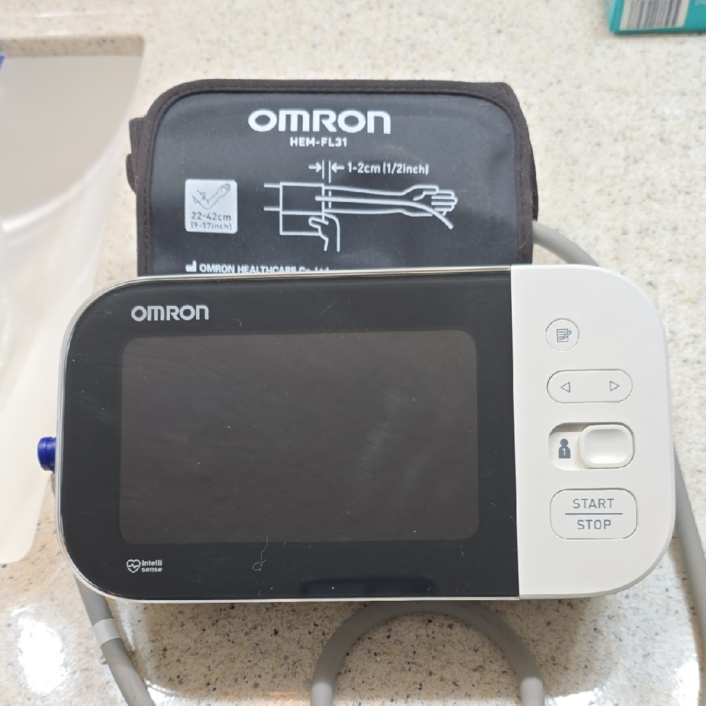 Like New. OMRON Digital Blood Pressure Monitor -Model BP7450. Battery Operated
